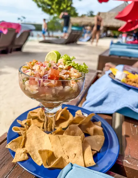 Fresh shrimp ceviche with chips served beachside at Brady’s Cay in Roatán, Honduras.