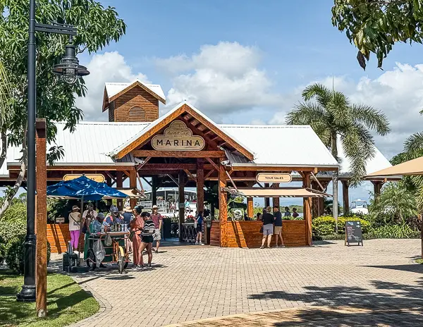 Cruise passengers near the Harvest Caye marina in Belize, where ferry tickets to Placencia Village and shore excursions are sold and taken from on Norwegian Cruise Line’s private island.