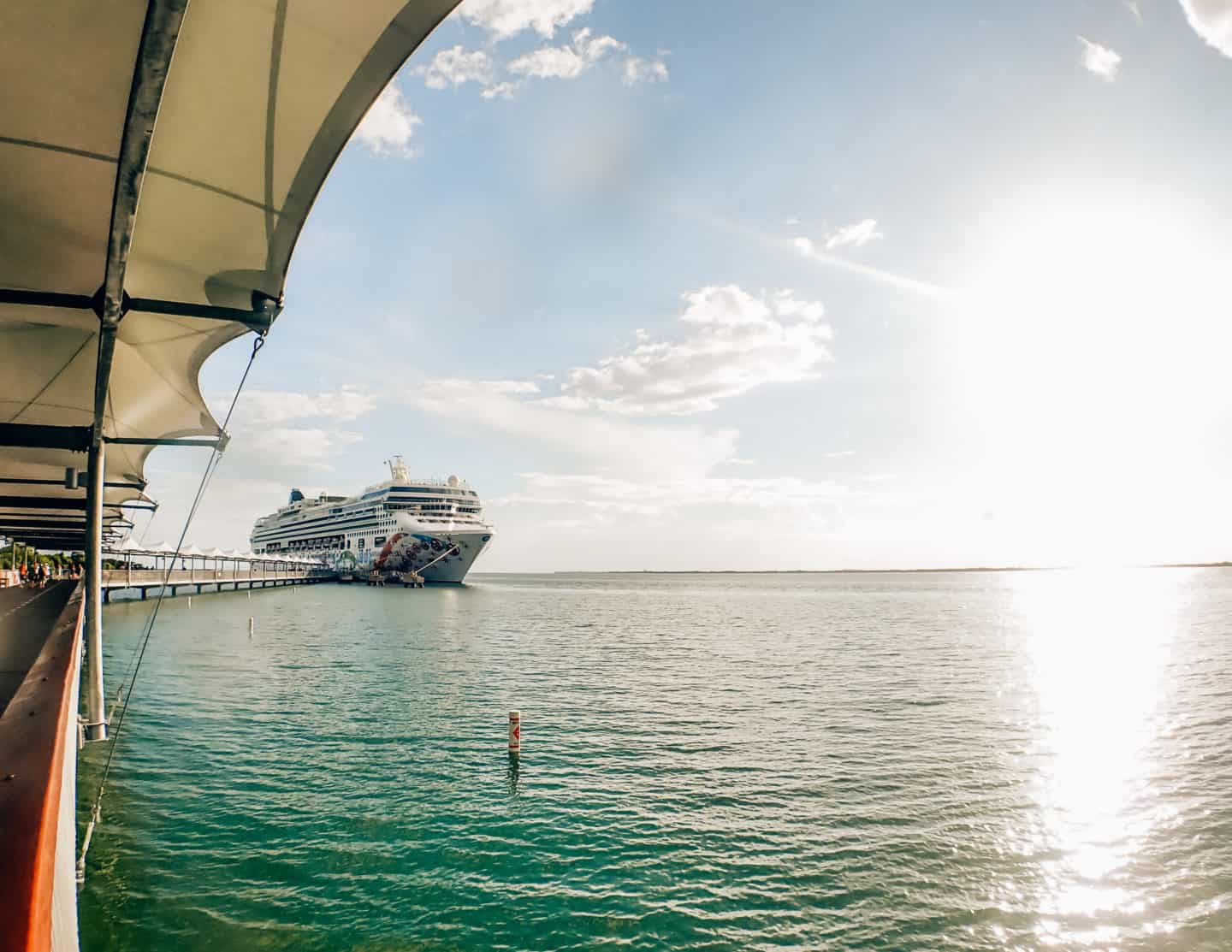 Norwegian Pearl Docked at Harvest Caye, Belize • How to Prepare for Your Cruise