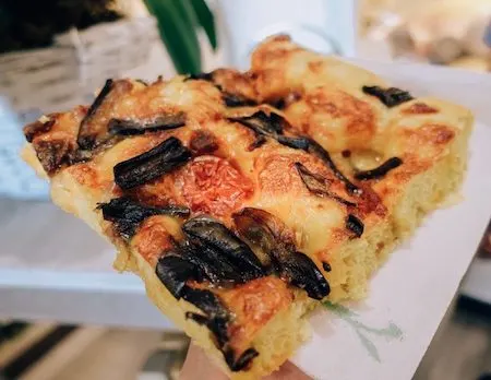 slice of fresh square pizza in Capri, Italy