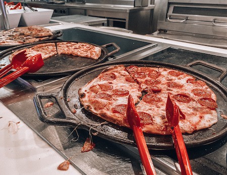 Pepporoniz pizza served on a buffet cruise ship