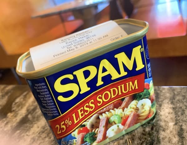 They use Spam containers as receipt holders at Kountry Kitchen