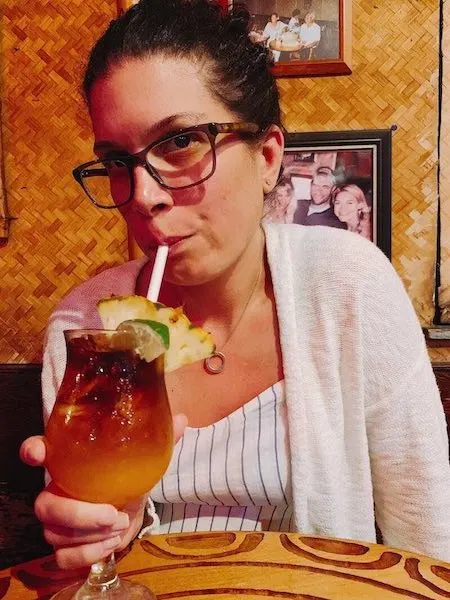 kathy enjoying a mai tai at tahiti nui