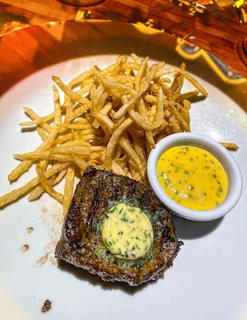 Filet mignon and pomme frites at Le Petite Chef Celebrity Equinox Dinner