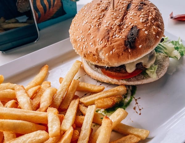 Burger and Fries served at Blue View Sunset Terrace