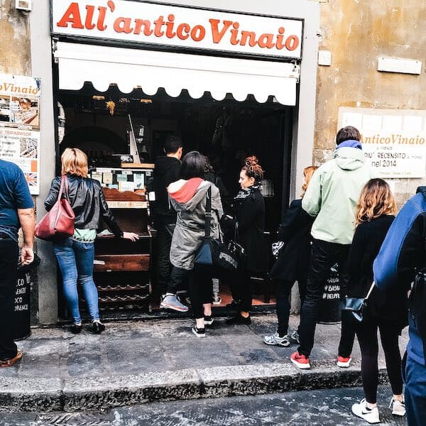 In line at All'antico Vinaio in Florence Italy