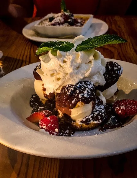 pastry puffs with ice cream and chocolate