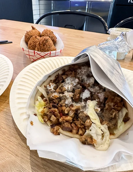 lamb gyro and falafel on a table