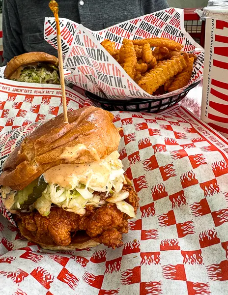 sand fried chicken sandwich and fries from howlin rays in pasadena