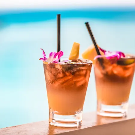 a couple of mai tai cocktails