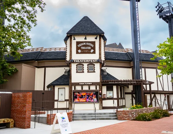 The Solvang Festival Theater façade, featuring its distinctive half-timbered design and Theaterfest signage.