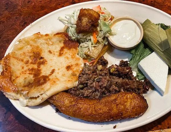 salvadorian cuisine of rice beans, sweet plantain, pupusas