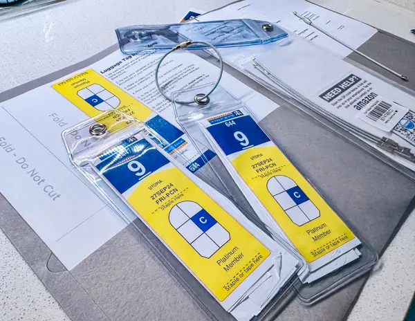 Royal Caribbean cruise luggage tags inserted into clear plastic luggage tag holders