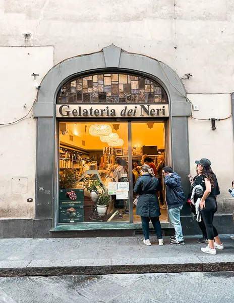 The facade of Gelateria dei Neri, with customers gathered outside, hints at the delicious offerings that await within.