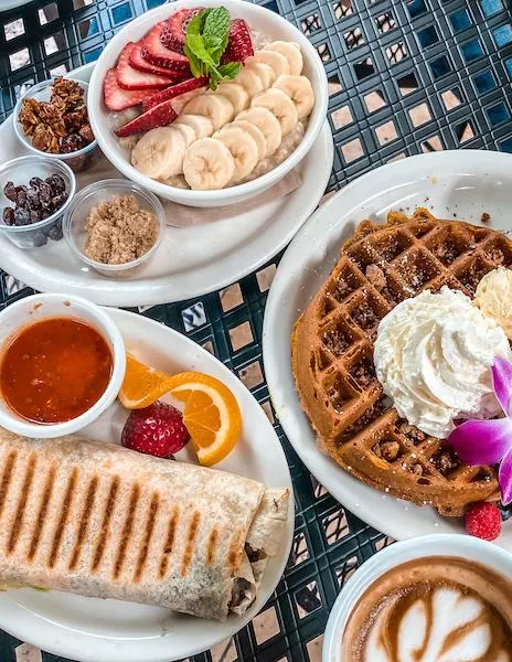 waffles, oatmeal bowl and breakfast burrito from urth caffee