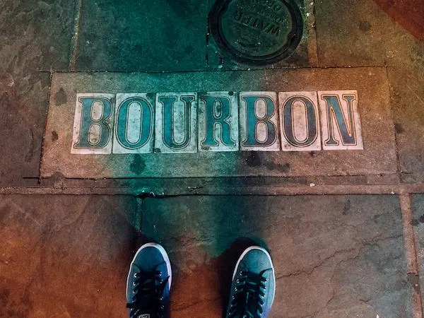 bourbon street name on sidealk