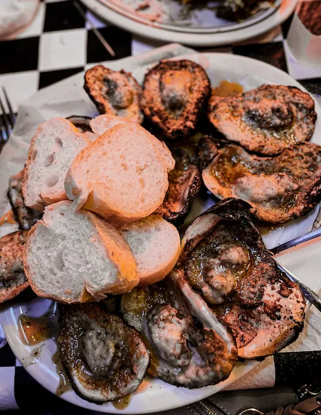 A dozen charbroiled oysters from Acme Oyster House