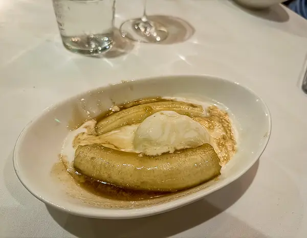 Bananas Foster served at Brennan’s Restaurant in New Orleans, featuring caramelized bananas and vanilla ice cream in the dessert’s birthplace.