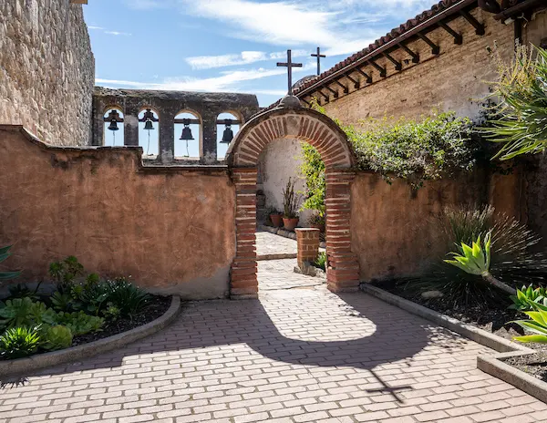entrance to the sacred garden of the mission san juan capistrano