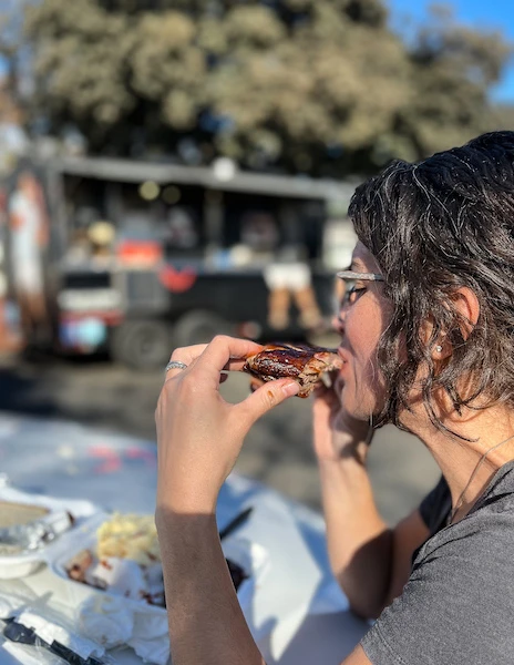 girl eating rib