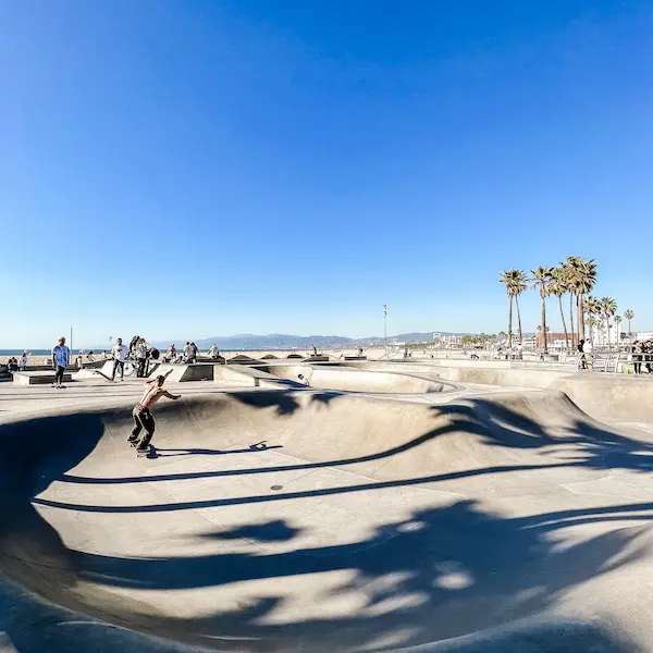 skateboarder riding at skatepark