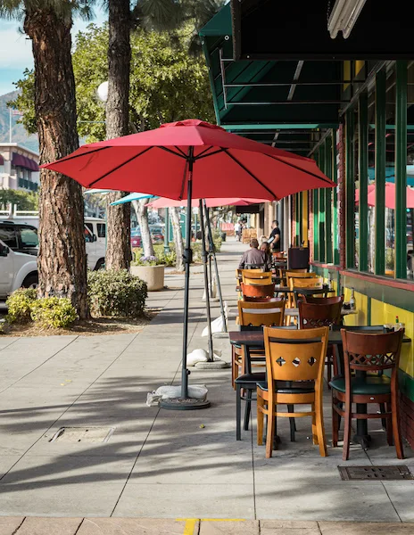 outdoor seat and outdoor red umbrella