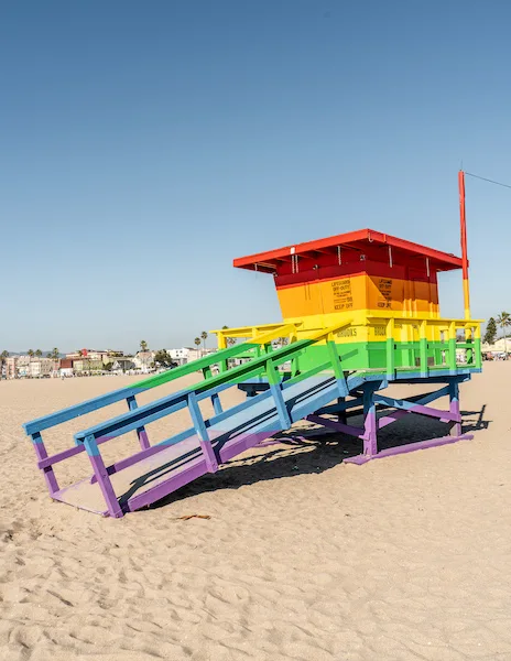lifeguard tower painted the colors of the raindow