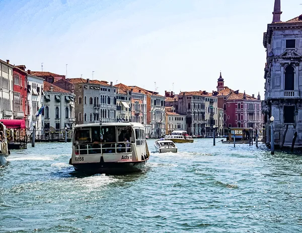 vaporetto riding along the grand canal in venice italy