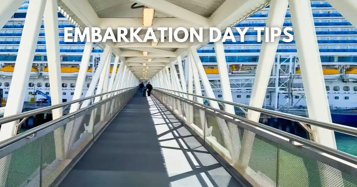 featured blog image: Covered gangway leading to a cruise ship on embarkation day, with large text overlay reading “Embarkation Day Tips.”
