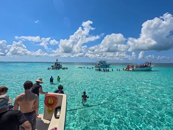 Passengers on a Grand Cayman shore excursion in the clear Caribbean water