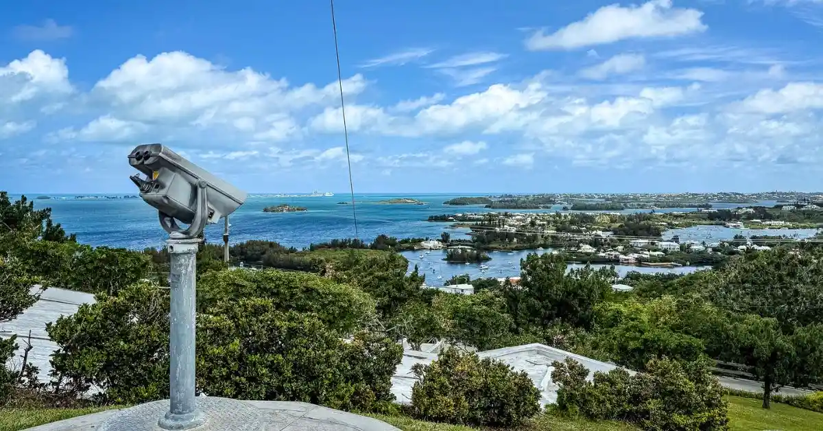 featured image: View from Gibb’s Hill Lighthouse overlooking Bermuda’s coastline and blue water, one of the scenic things to do in Bermuda on a cruise.