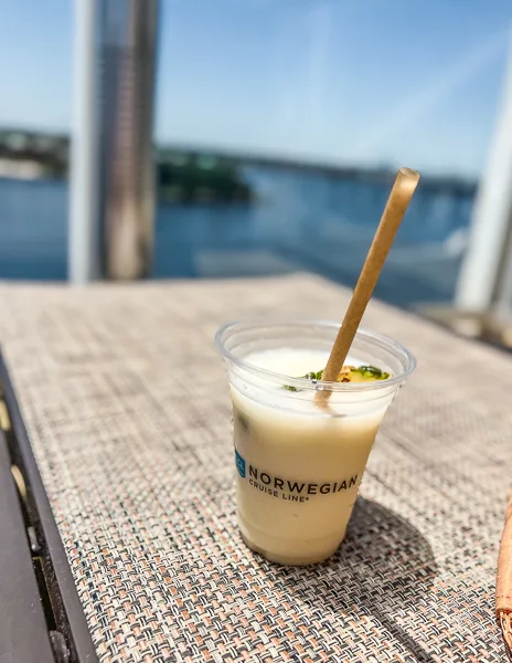 pina colada sitting on cruise ship pool chair