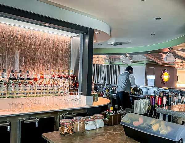 bartendering bartending behind bar on a norwegian cruise ship