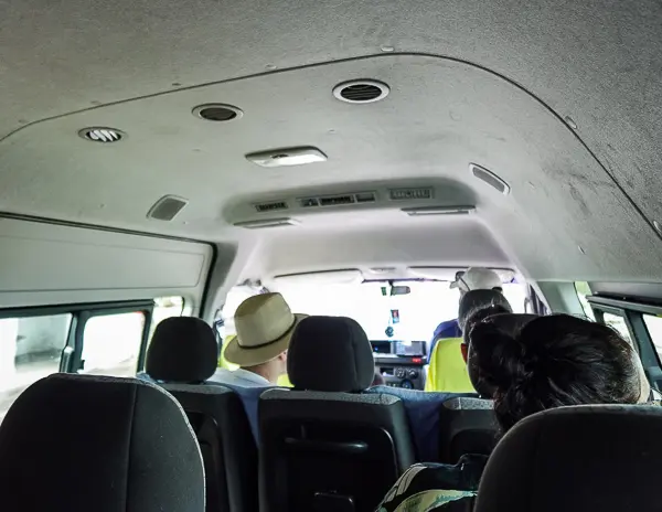 View from inside a private minibus while exploring Bermuda with a group and local driver.