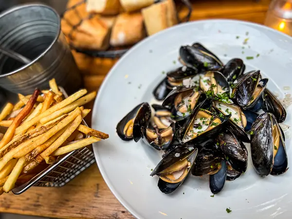 bowl of mussels and pomme frites from entre nous in pasadena