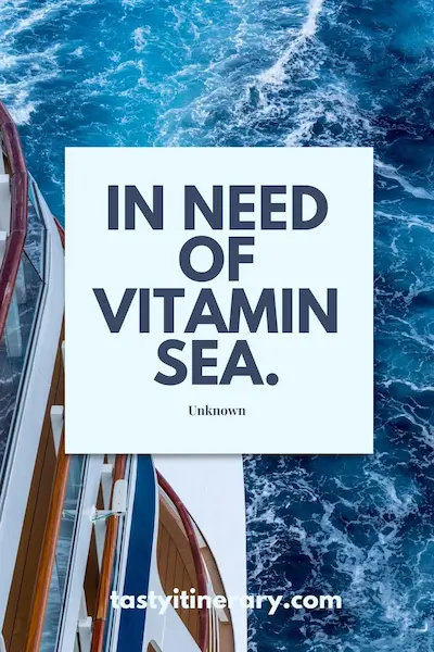 pinterest graphic: Photo of cruise ship deck sailing through deep blue ocean water with overlay text saying “In Need of Vitamin Sea”