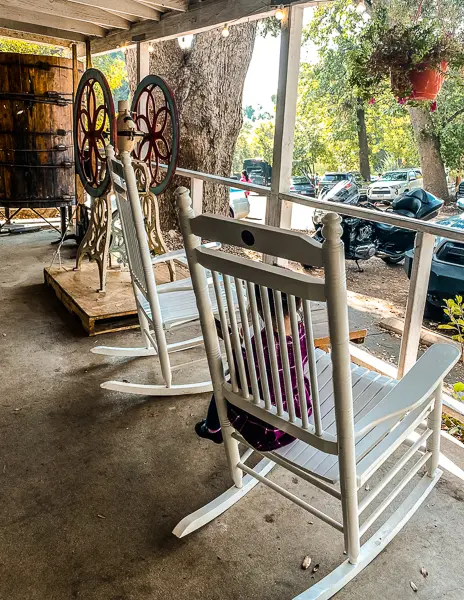 rocking chairs on the porch of wilshires apple shed