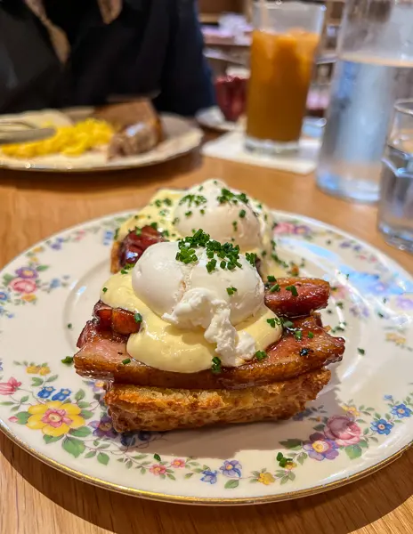 eggs benedict with cheddar biscuits and pork belly