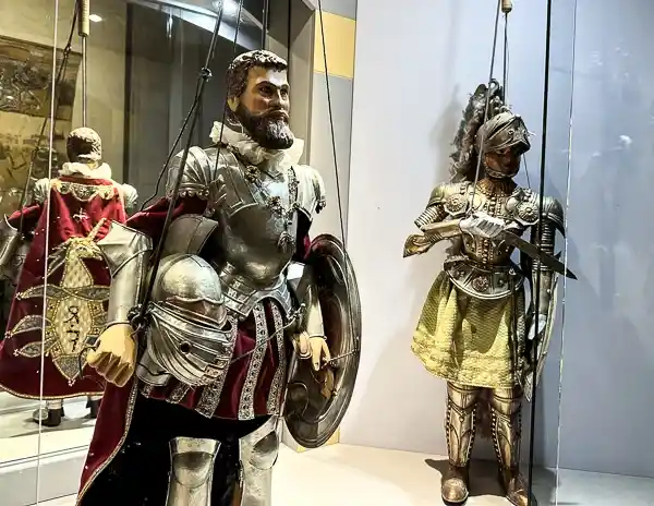 Armored knight marionette puppets on display at the Giordano Ferrari Puppet Museum in Parma, Italy