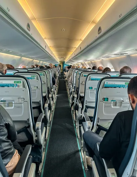 inside of plane with passengers