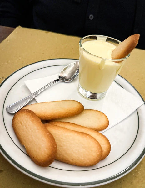 marscapone cream with cat tongue cookies from cinghiale bianco in florence