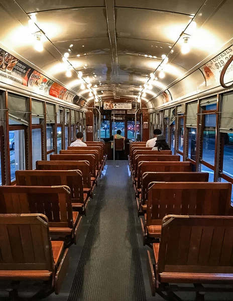 vintage wooden seating inside new orleans streetcar