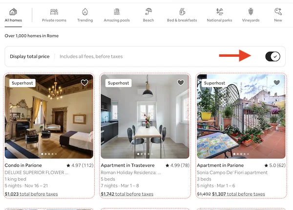 Screenshot of Airbnb search results with an arrow pointing to the 'Display total price' toggle, showing listings with prices including all fees before taxes.
