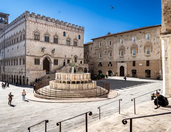 View of Fontana Maggiore in Piazza IV Novembre, Perugia, Italy, with Palazzo dei Priori and surrounding historic buildings on a sunny day during one day in Perugia