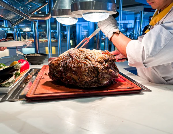 roast beef at the carving station at the buffet on celebrity solstice