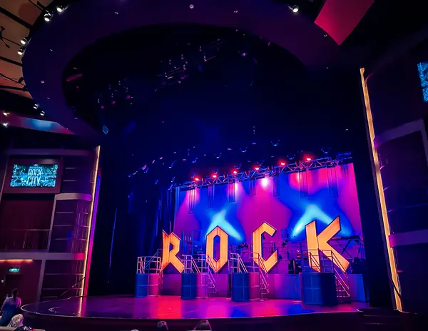 the word rock lit up on stage