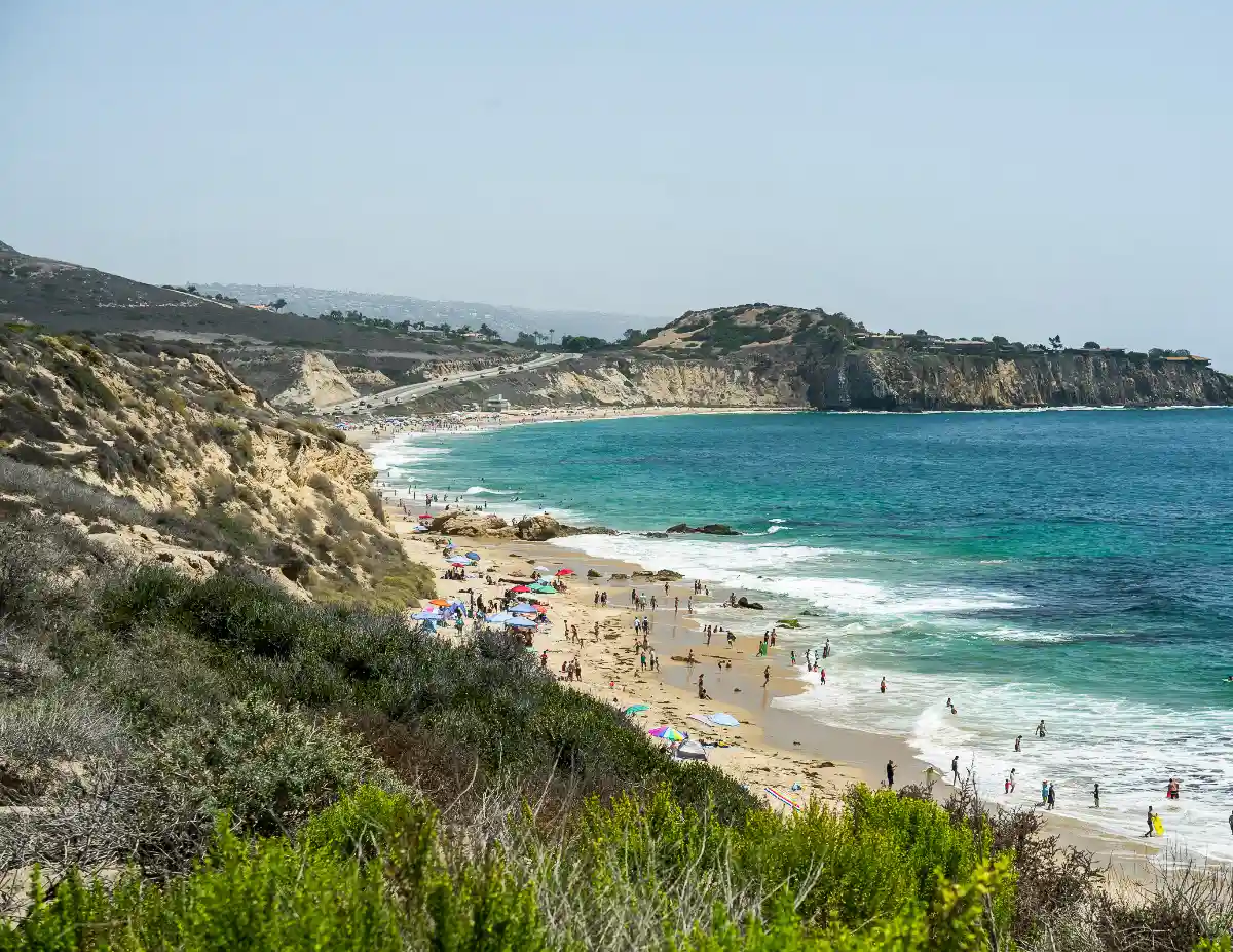 people enjoying a day on crystal cove state park beach