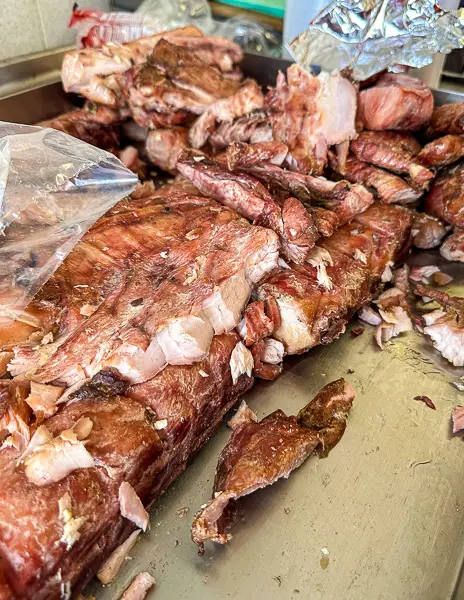 A pile of smoked marlin being prepared during a Mazatlán food tour.