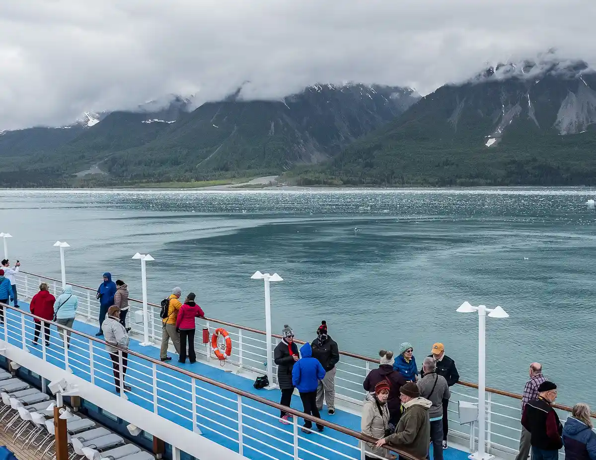 cruisers enjoying the views from an alaska cruise