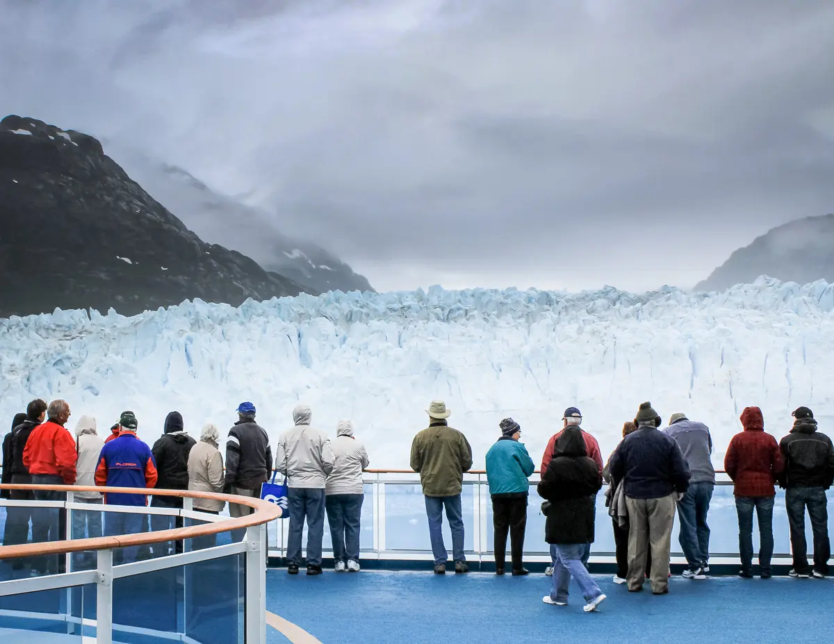 cruisers gathering on a cruise to view a glacier